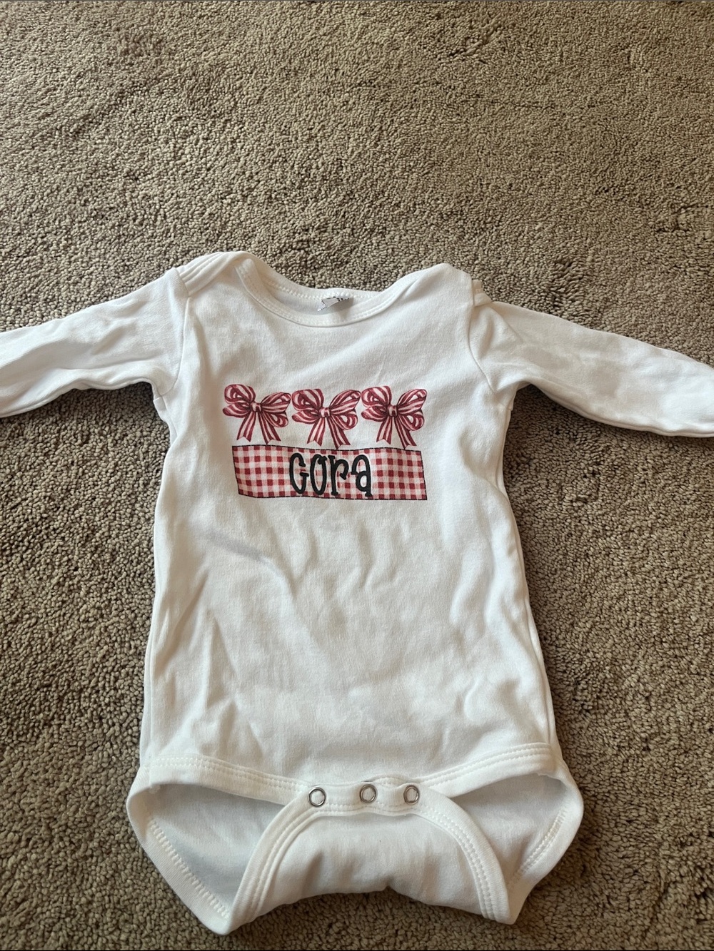 Cora- Christmas White Long-Sleeve Baby One-Piece with Pink Bow Graphic